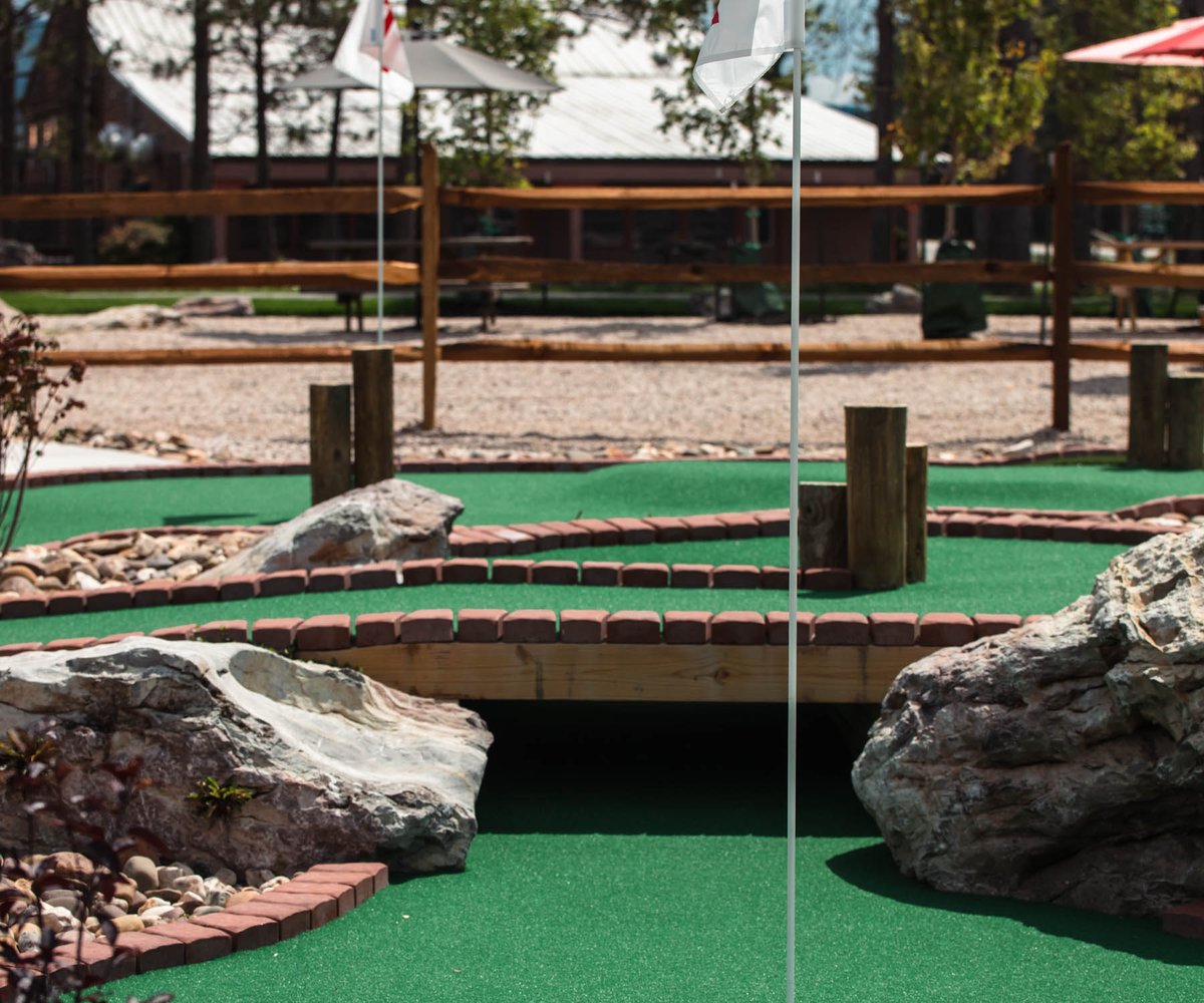 Mini golf hole with water feature at Almost Heaven Mini Golf