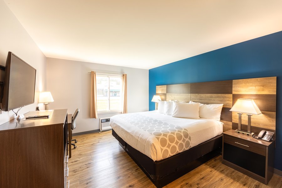 Pet-friendly king room with king bed, executive desk, and marble shower at The Inn at Canaan